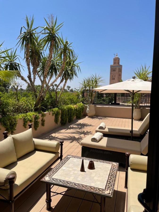 เล ฌาร์แด็ง เดอ ลา กูตูเบีย Hotel มาร์ราเกช ภายนอก รูปภาพ Rooftop terrace at the Four Seasons Hotel in Marrakech, Morocco
